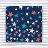 Giftwrap - Multi coloured stars on blue (WR62)